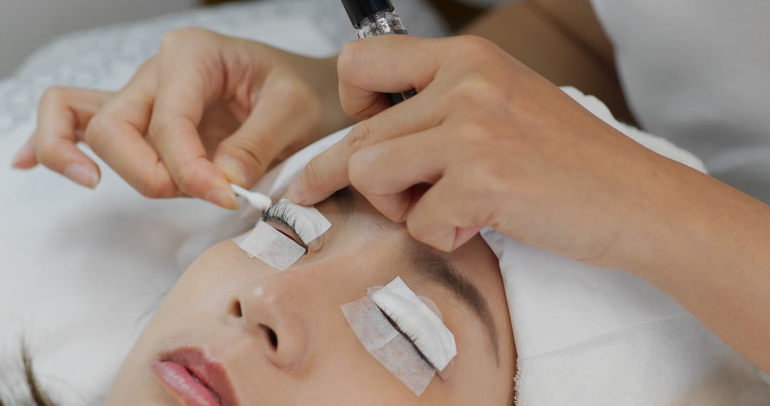 Woman Perm Her Eyelash at Beauty Salon